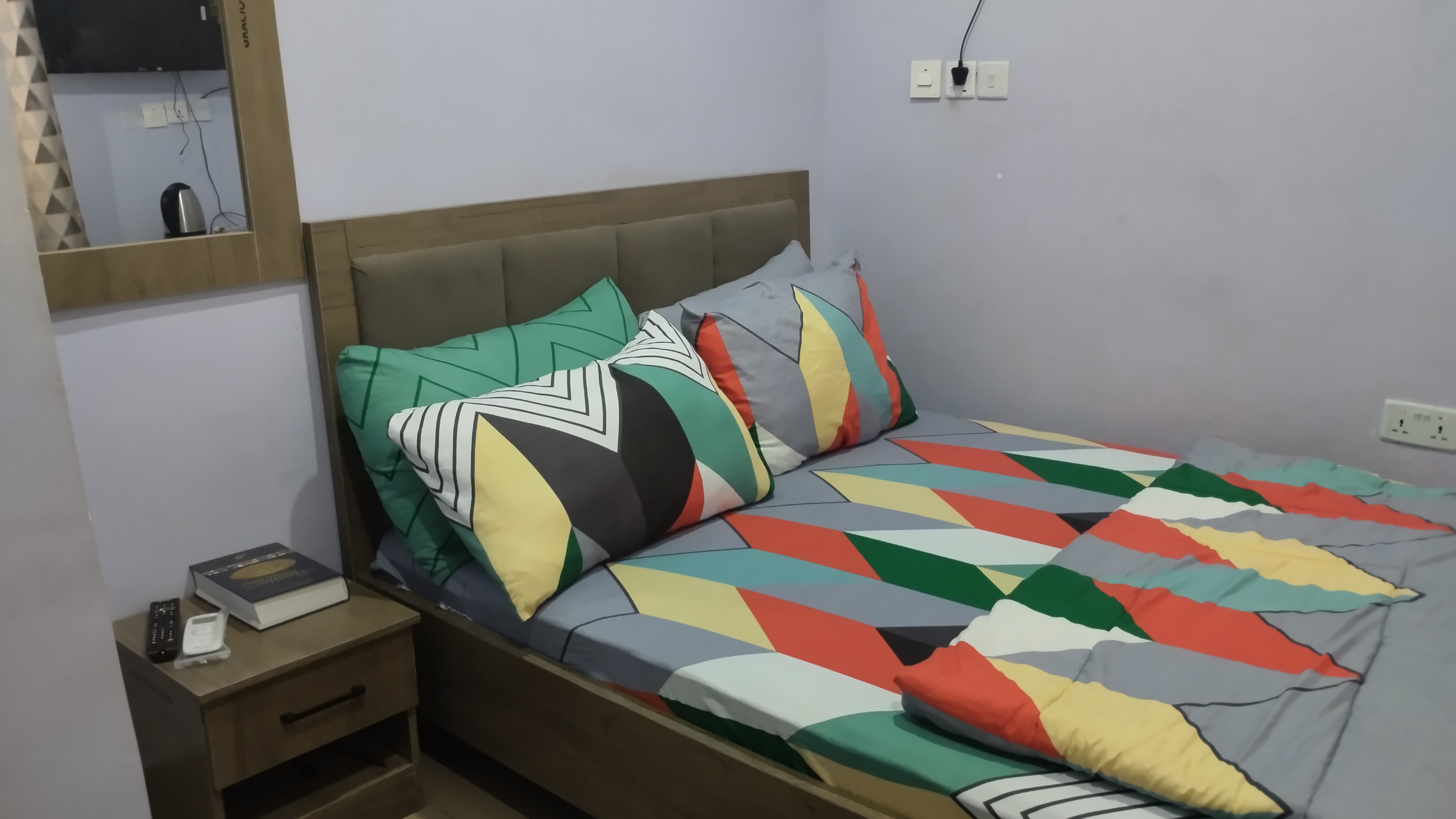Gracious Lodge room 2 comfortable bed with quality linens, Abuja